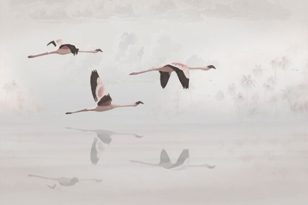 A group of flamingos flying over water A group of flamingos flying over water