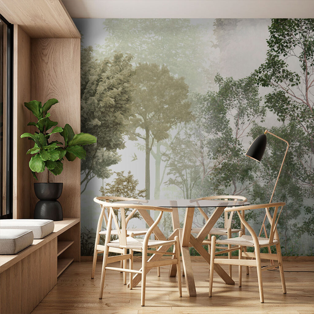 A group of trees in a foggy forest