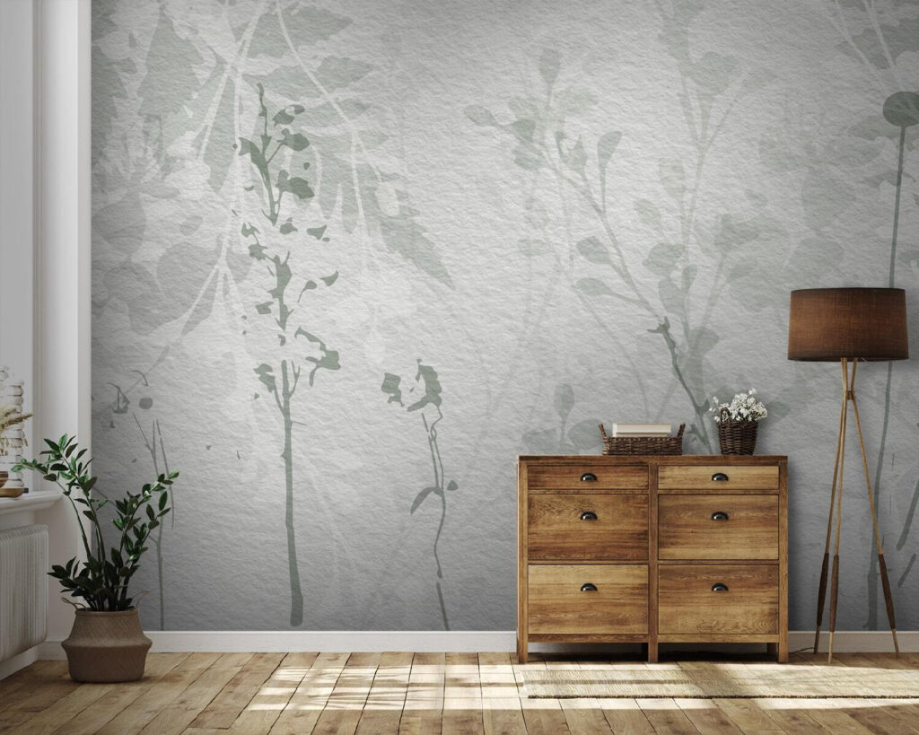 White wall with green leaves