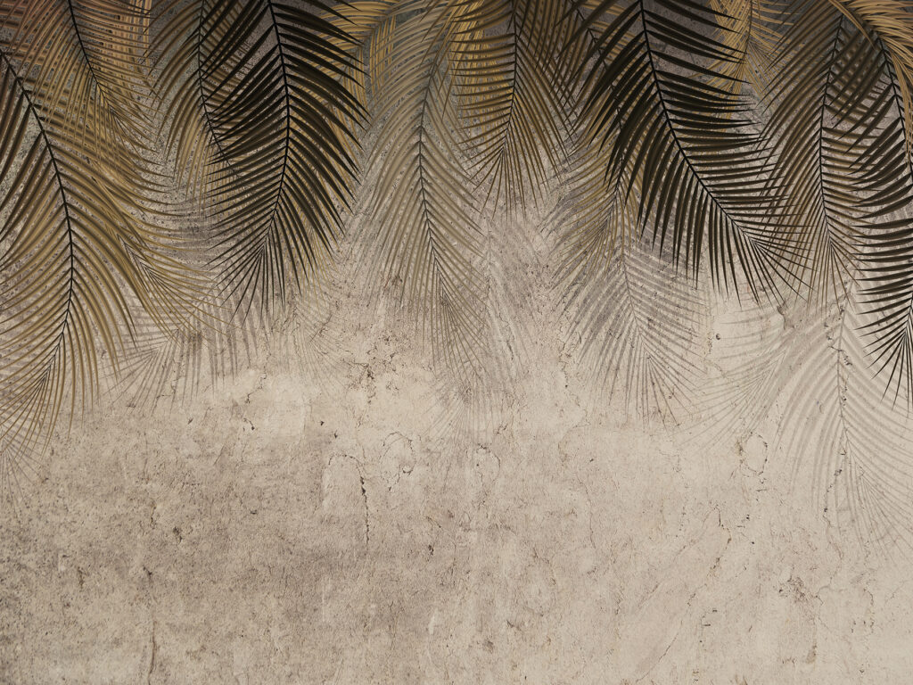 Hojas de palmera sobre un fondo texturizado Hojas de palmera sobre un fondo texturizado