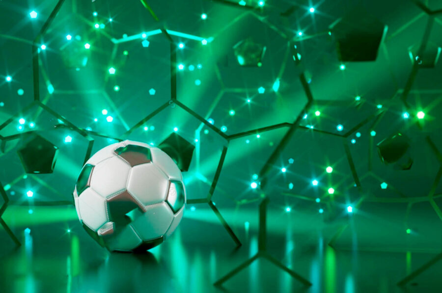 Balón de fútbol sobre una superficie reflectante