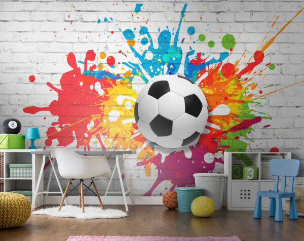 Balón de fútbol en una pared de ladrillos Balón de fútbol en una pared de ladrillos