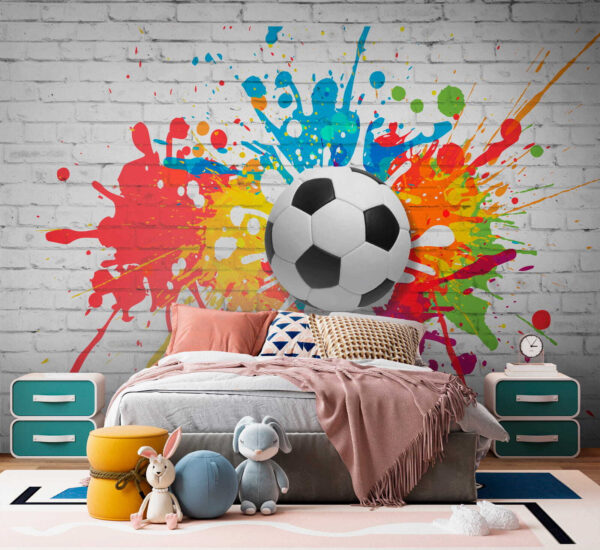 Balón de fútbol en una pared de ladrillos Balón de fútbol en una pared de ladrillos