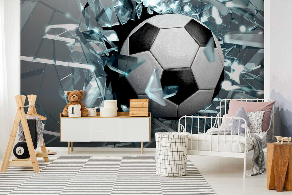 Football ball breaking through glass