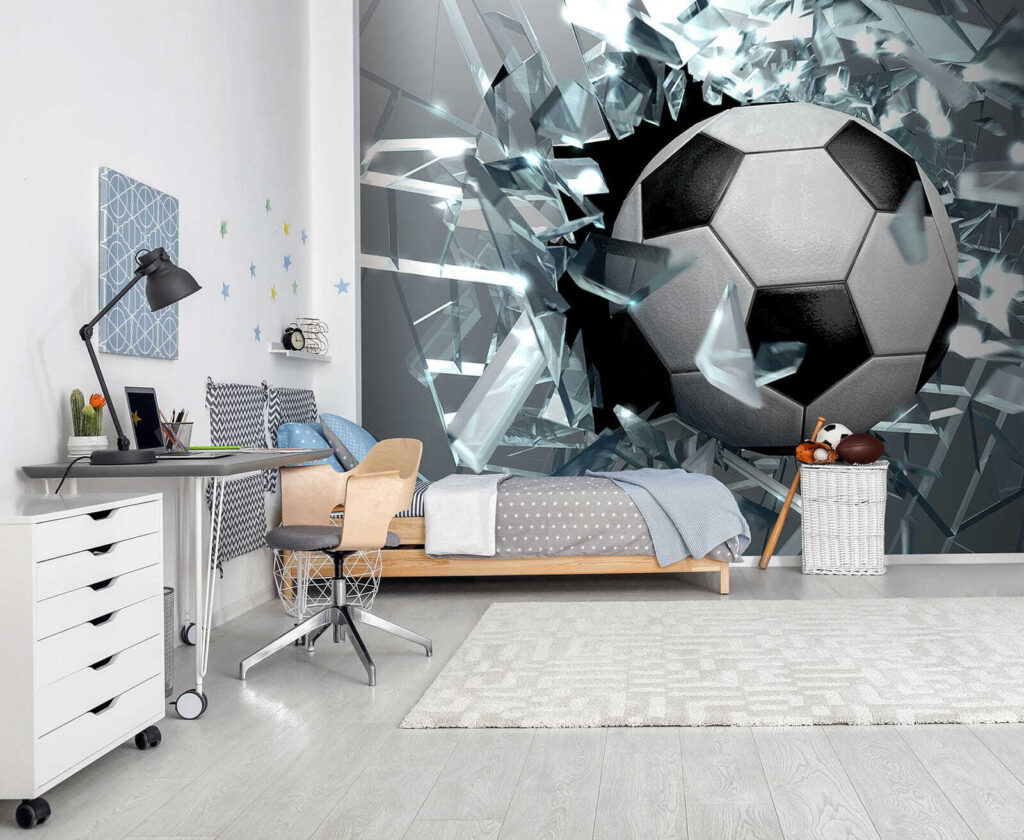 Football ball breaking through glass