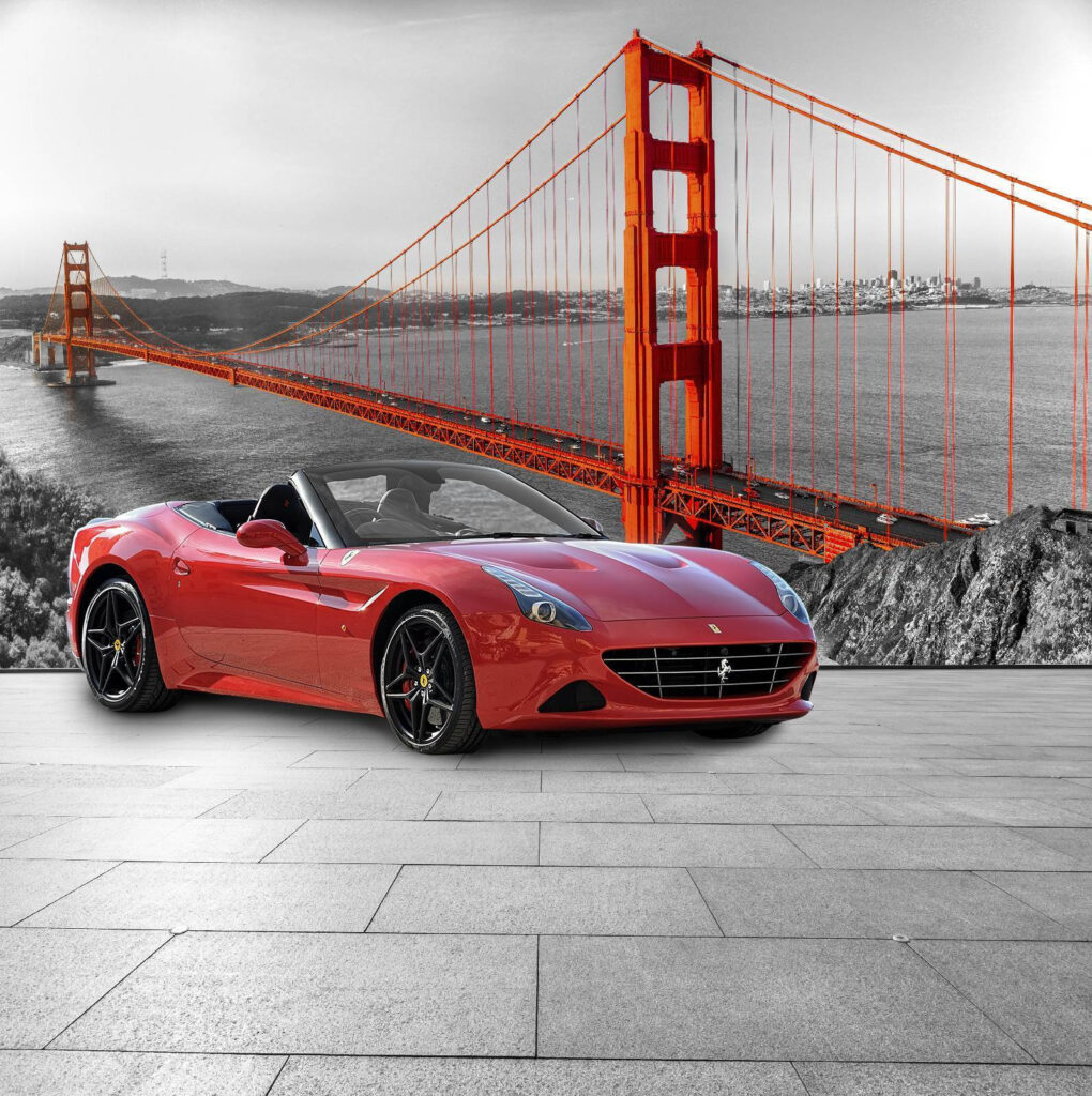 Coche deportivo rojo en una carretera con un puente de fondo Coche deportivo rojo en una carretera con un puente de fondo