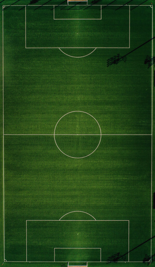 Campo de fútbol con un círculo blanco Campo de fútbol con un círculo blanco