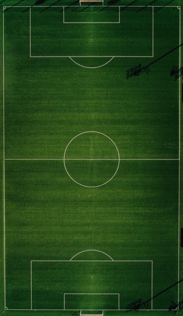 Campo de fútbol con un círculo blanco Campo de fútbol con un círculo blanco