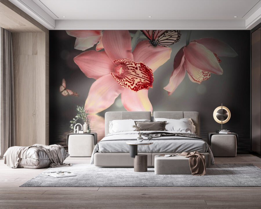 Orquídeas rosas y mariposas en una rama