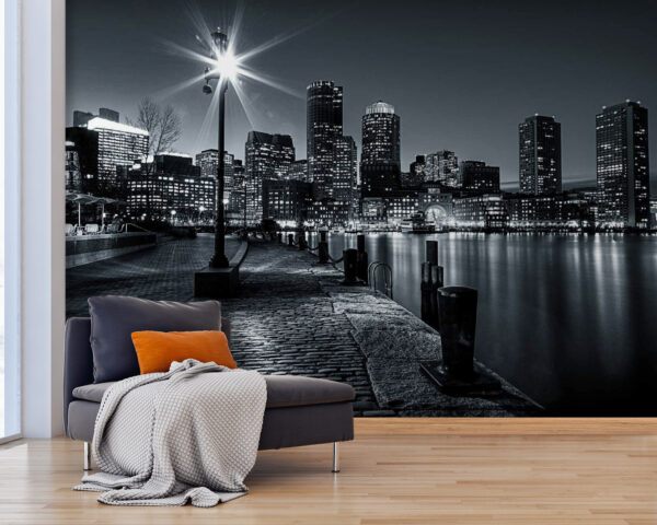 El horizonte de una ciudad con luces sobre el agua El horizonte de una ciudad con luces sobre el agua