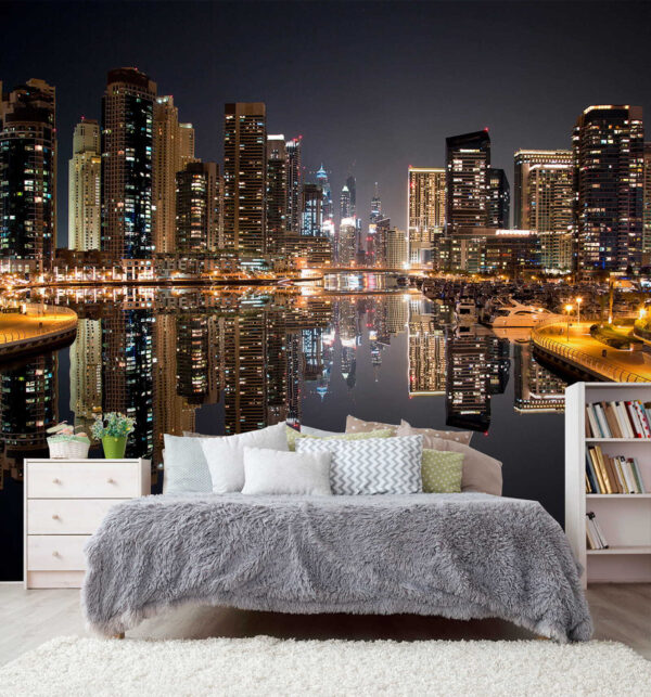 Horizonte de la ciudad con luces reflejándose en el agua Horizonte de la ciudad con luces reflejándose en el agua