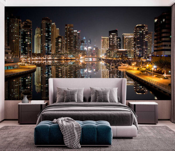 Horizonte de la ciudad con luces reflejándose en el agua Horizonte de la ciudad con luces reflejándose en el agua