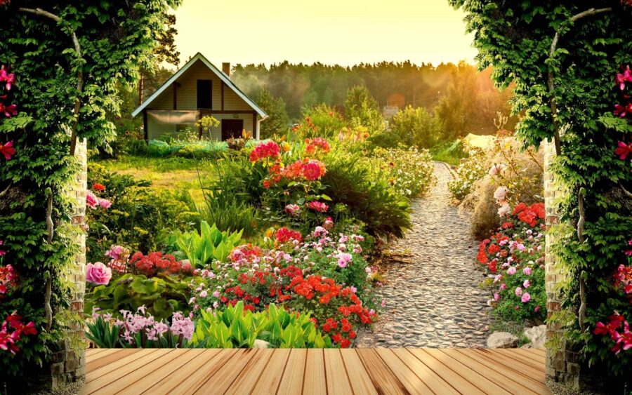 Jardín con flores y una casa