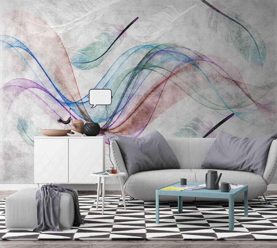 Plumas de colores sobre una superficie blanca