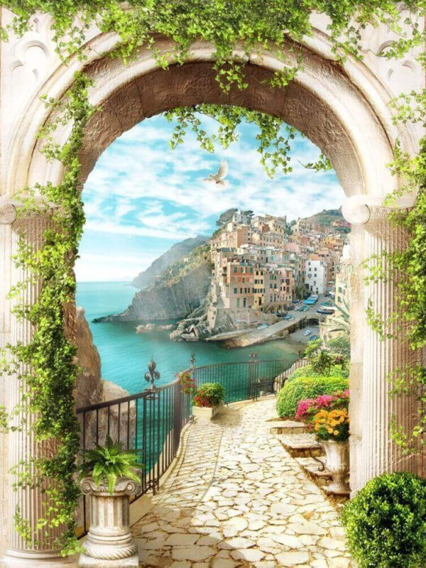 Arco de piedra con vistas a una ciudad y al agua Arco de piedra con vistas a una ciudad y al agua