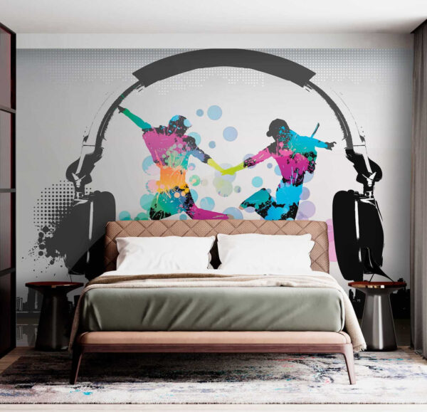 Couple of people jumping in the air with headphones Couple of people jumping in the air with headphones