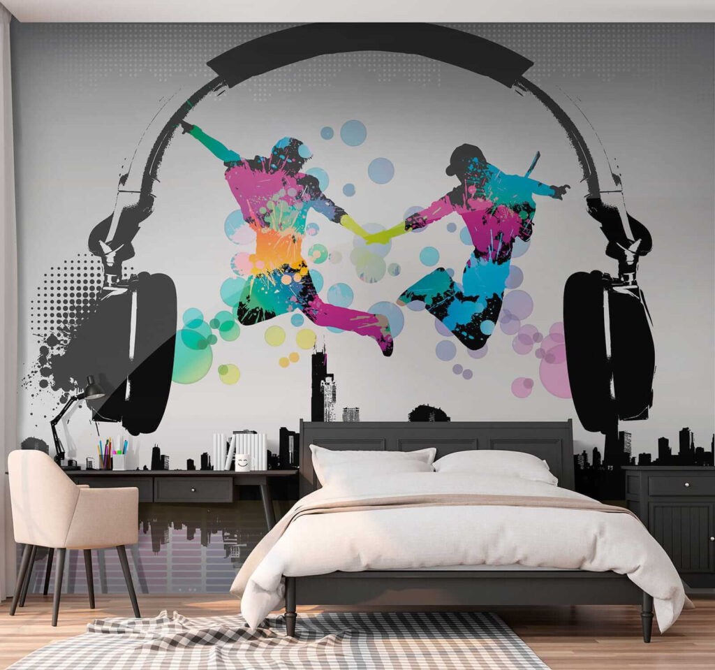 Couple of people jumping in the air with headphones Couple of people jumping in the air with headphones