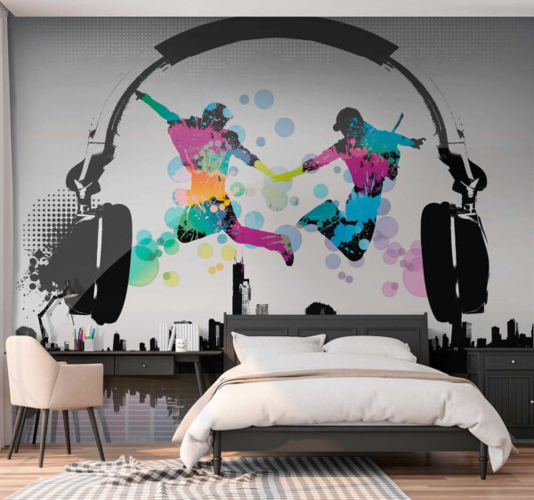 Couple of people jumping in the air with headphones Couple of people jumping in the air with headphones