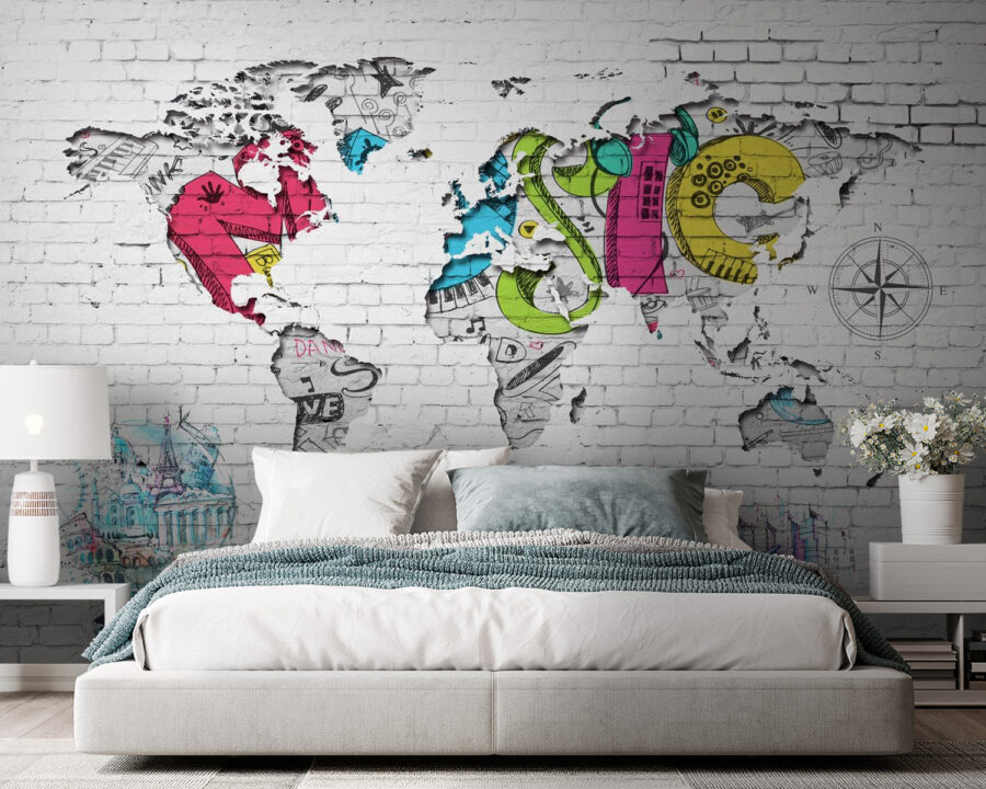 Mapa del mundo pintado en una pared de ladrillo