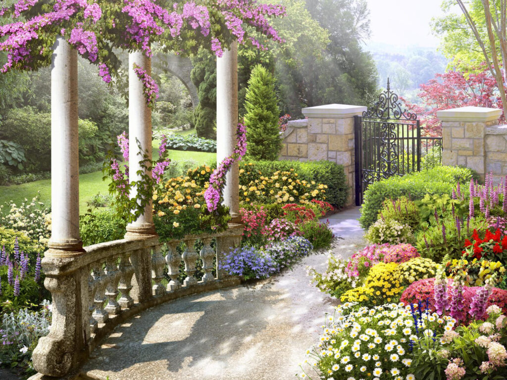 Jardín con verja y flores Jardín con verja y flores