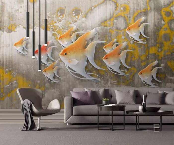 Peces de colores nadando juntos con gracia.