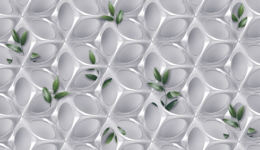 Pared blanca con hojas verdes