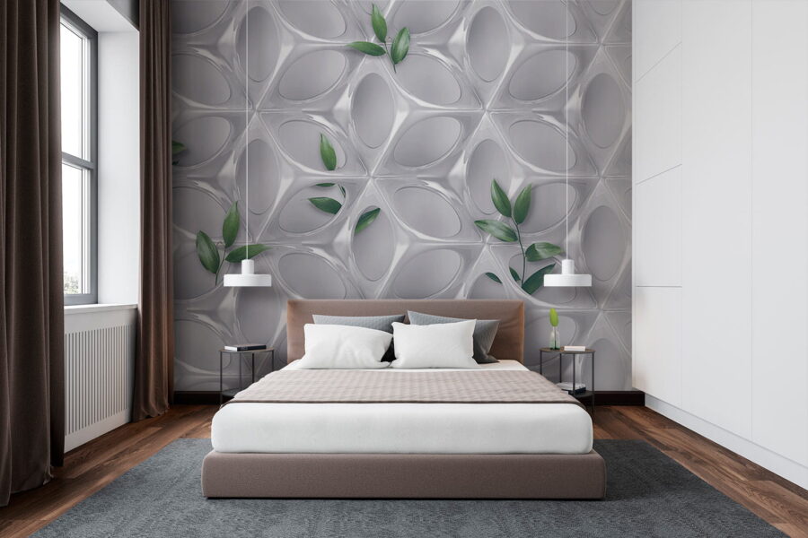 Pared blanca con hojas verdes