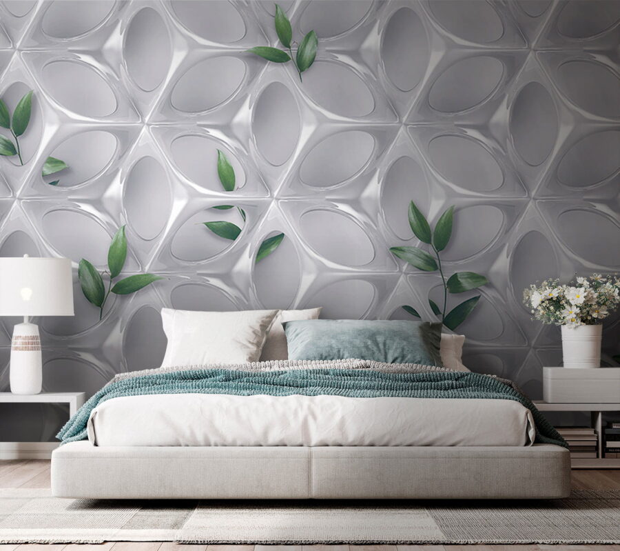 Pared blanca con hojas verdes