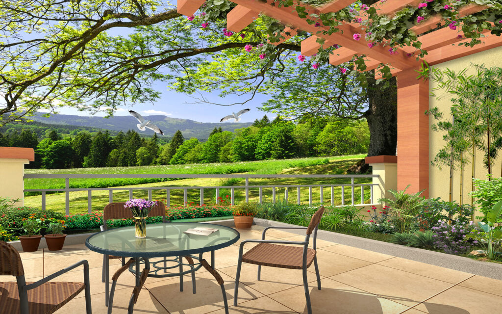 Patio con mesa y sillas y vistas a un campo verde Patio con mesa y sillas y vistas a un campo verde