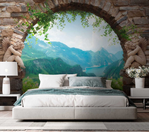 Arco de piedra con estatuas de piedra y vistas a un valle y montañas Arco de piedra con estatuas de piedra y vistas a un valle y montañas