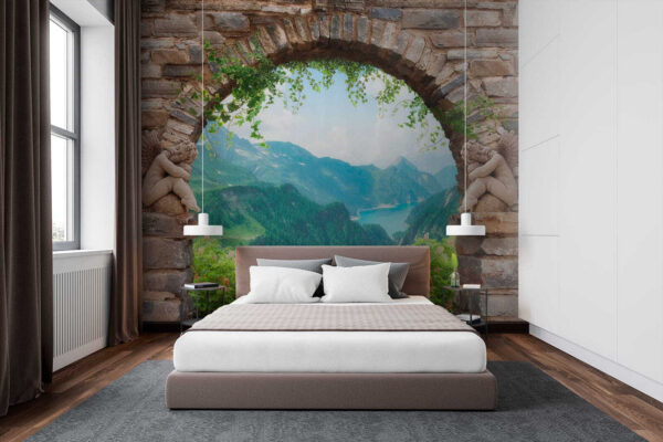Arco de piedra con estatuas de piedra y vistas a un valle y montañas Arco de piedra con estatuas de piedra y vistas a un valle y montañas