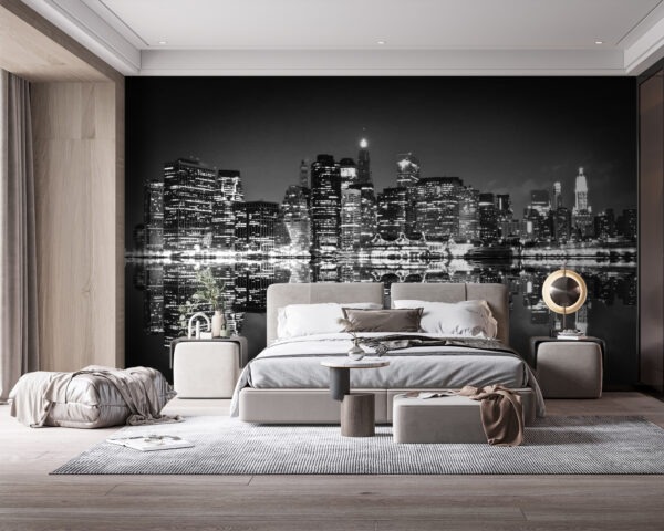 El horizonte de la ciudad de noche con luces reflejándose en el agua El horizonte de la ciudad de noche con luces reflejándose en el agua