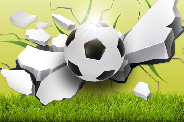 Balón de fútbol que atraviesa un muro Balón de fútbol que atraviesa un muro