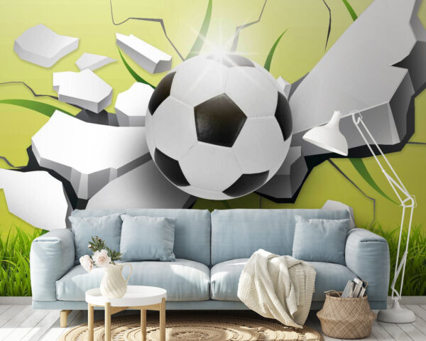 Balón de fútbol que atraviesa un muro Balón de fútbol que atraviesa un muro