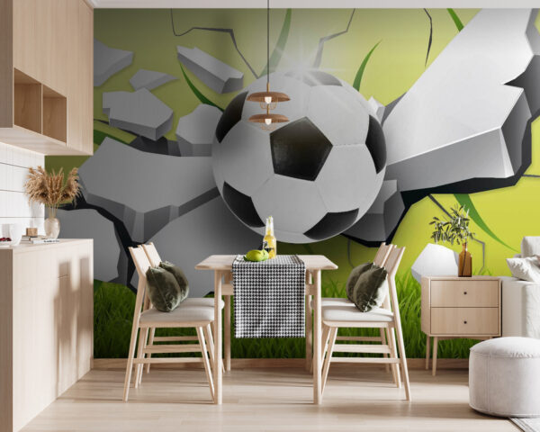 Balón de fútbol que atraviesa un muro Balón de fútbol que atraviesa un muro