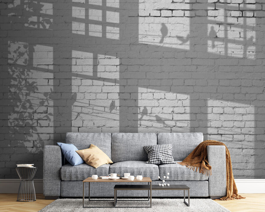 Pared con ventanas y sombra de pájaros