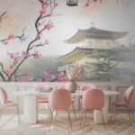 Fotomurales Árbol con flores rosas y un edificio al fondo