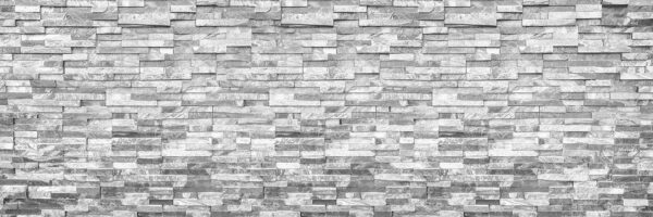 Pared de piedra texturizada en diseño monocromo. Pared de piedra texturizada en diseño monocromo.
