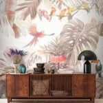 Fotomurales Grupo de pájaros en una rama rodeados de plantas tropicales