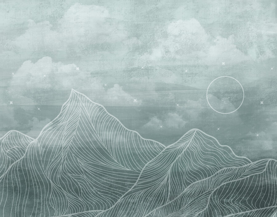 Una cordillera con nubes y sol