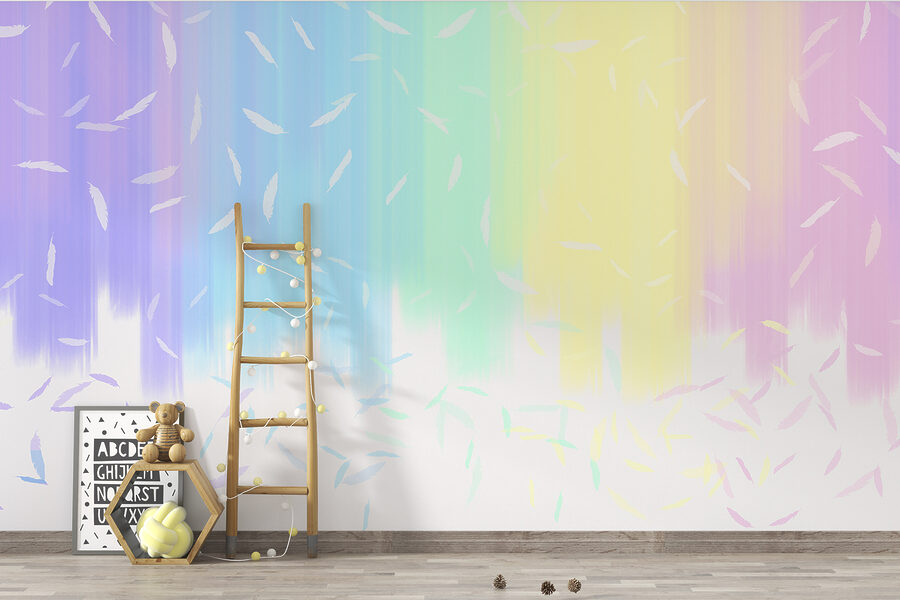 Un fondo con los colores del arco iris y plumas blancas que caen