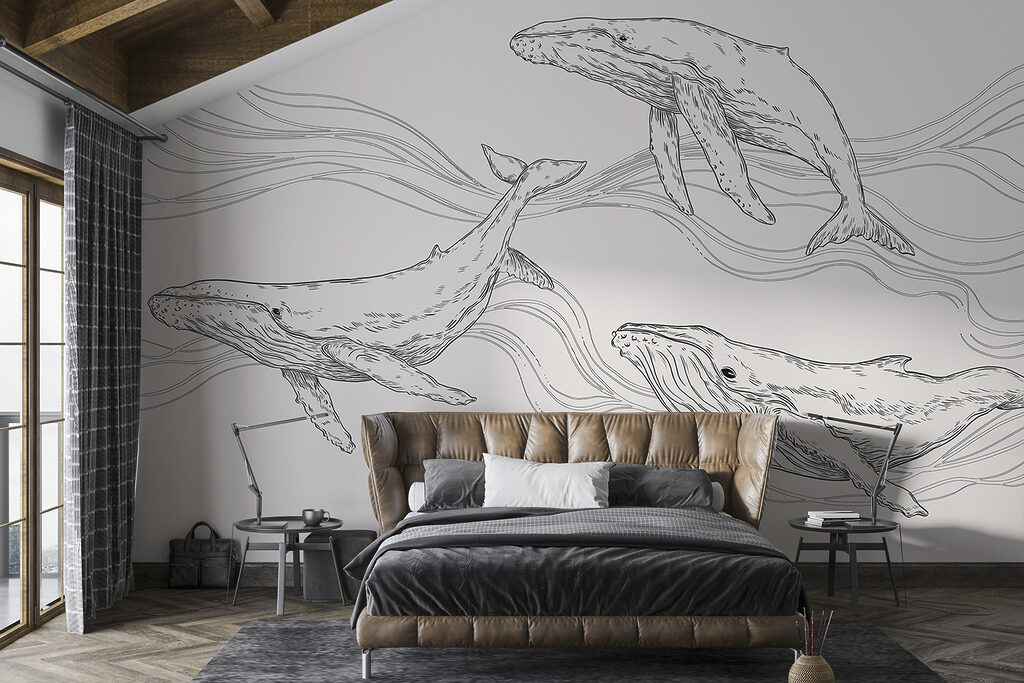 A group of whales swimming in the water A group of whales swimming in the water