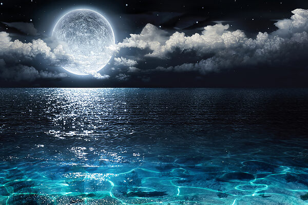 A moon over water at night A moon over water at night