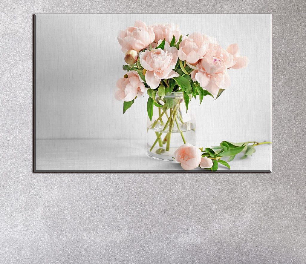 A vase of pink flowers