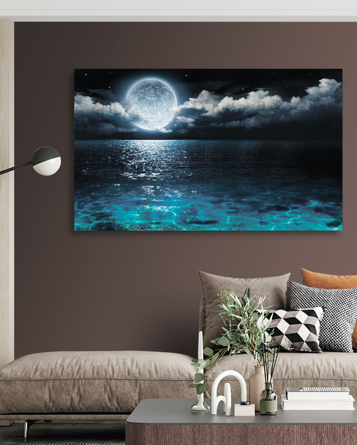 A moon over water at night A moon over water at night