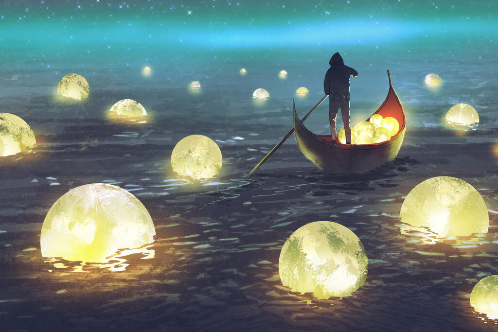 A person in a boat with glowing balls floating in the water A person in a boat with glowing balls floating in the water