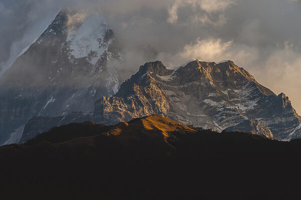 A mountain range with snow on top