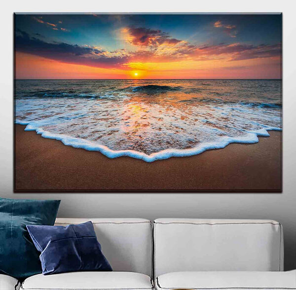 Cuadros Una puesta de sol sobre la playa