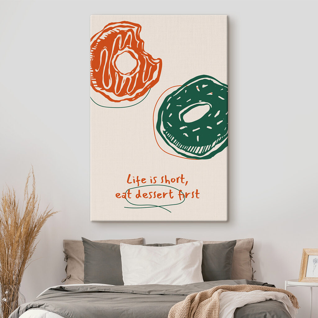 A drawing of donuts with green and orange icing