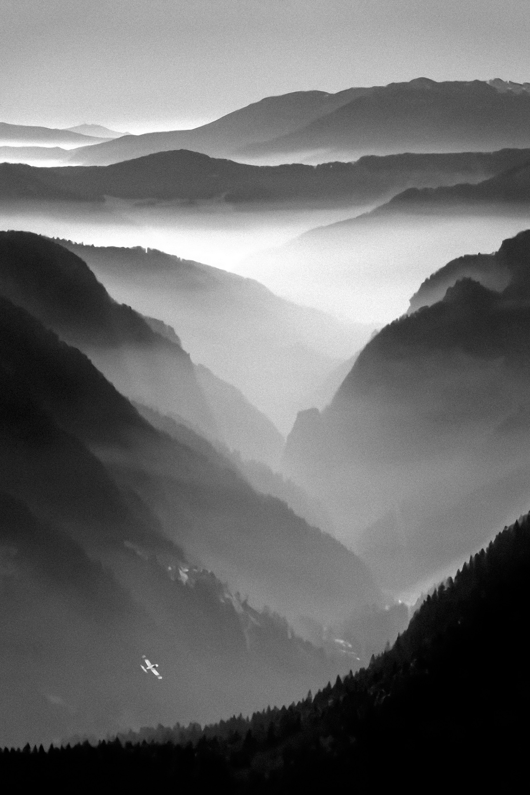 A black and white photo of mountains A black and white photo of mountains